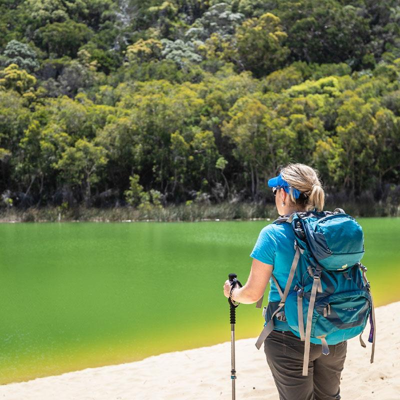 Lady exploring lakes on K'gari